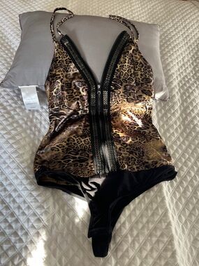 Bebe New Leopard Print Zip-Front Bodysuit in Brown and Black.